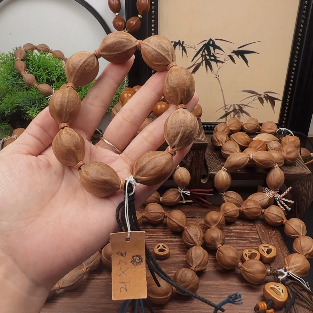 永***年橄榄核手串21.28梅林铁核