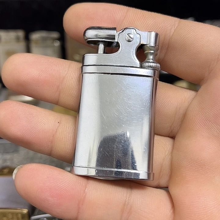 ****古董打火机气磕头