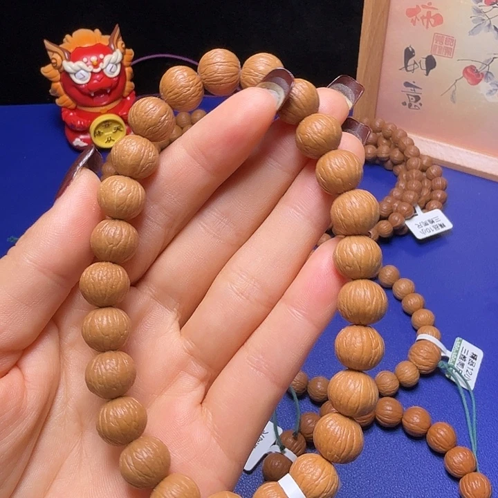 惠***凯猴头核桃吊坠凤羽