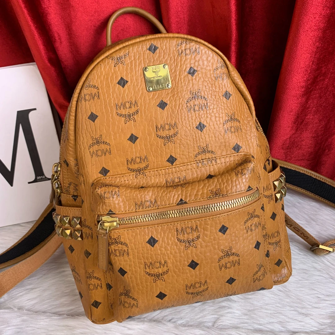 95新 MCM 干邑色双肩包/WJ08424011/4011