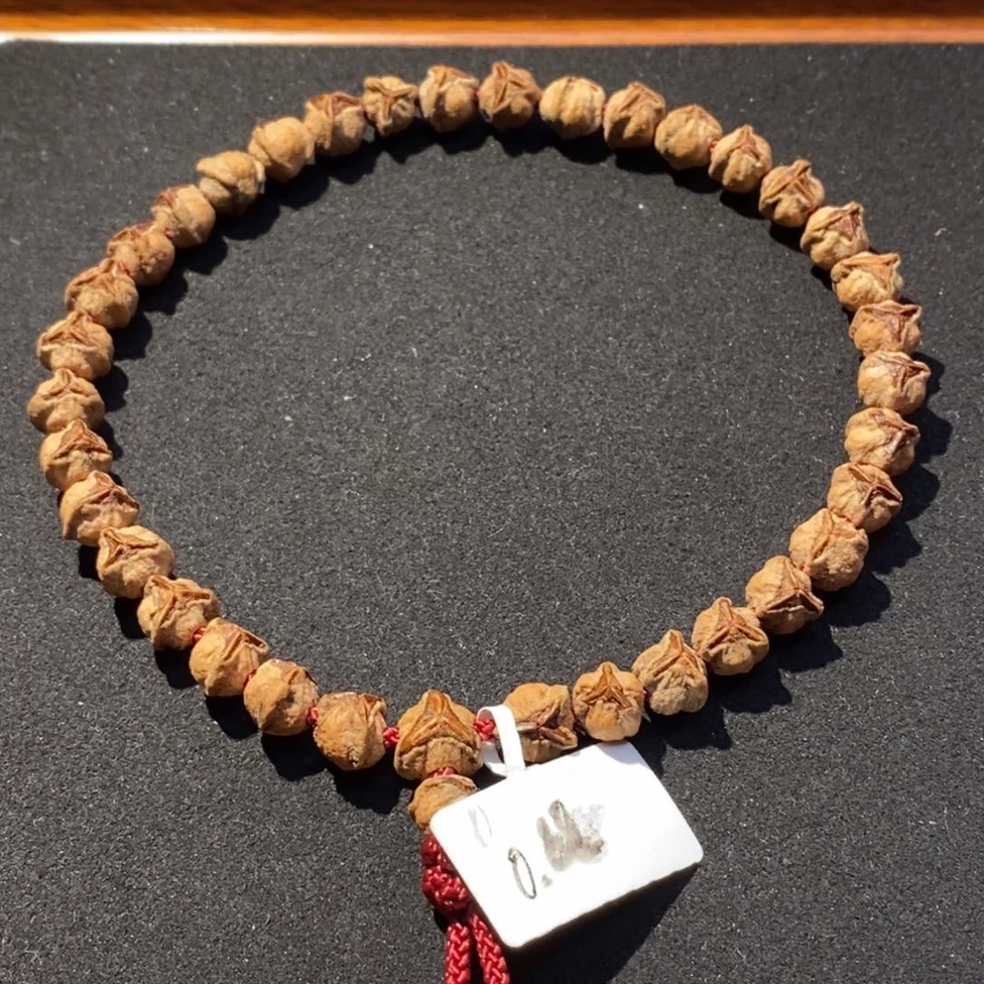 朵***朵柏香籽/百香籽吊坠