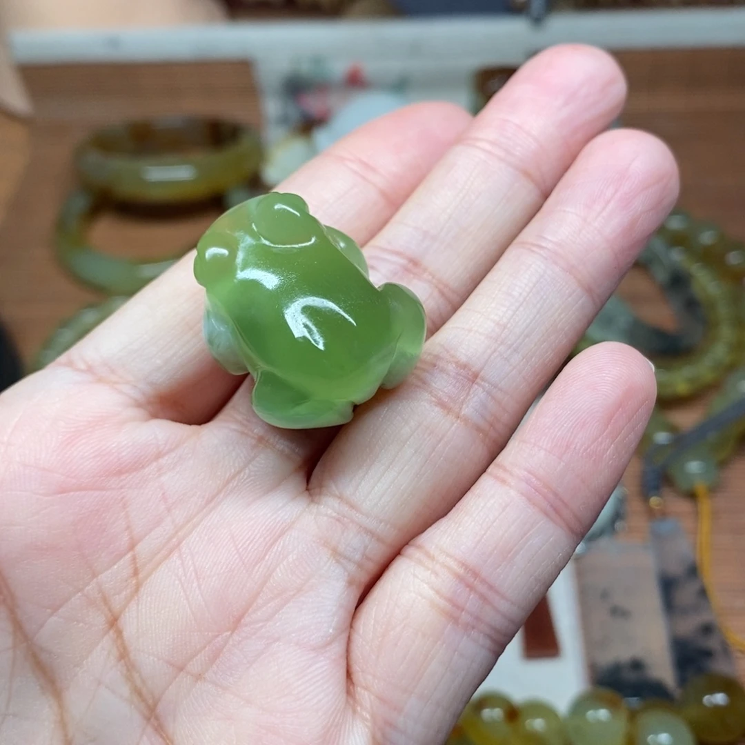 孙***景未镶嵌蛇纹石玉手机链