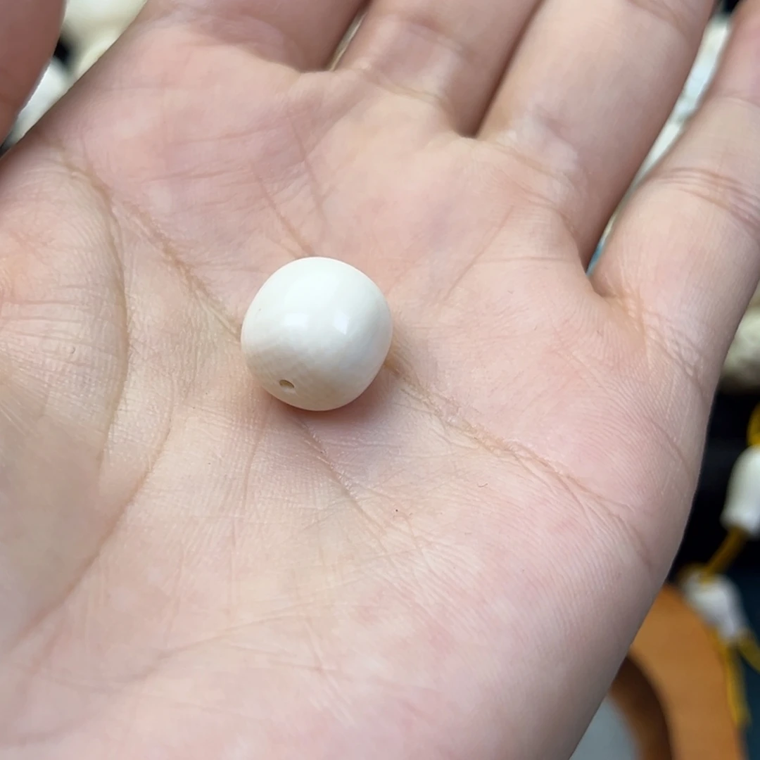 钟***.吊坠猛犸象牙12mm老型单颗