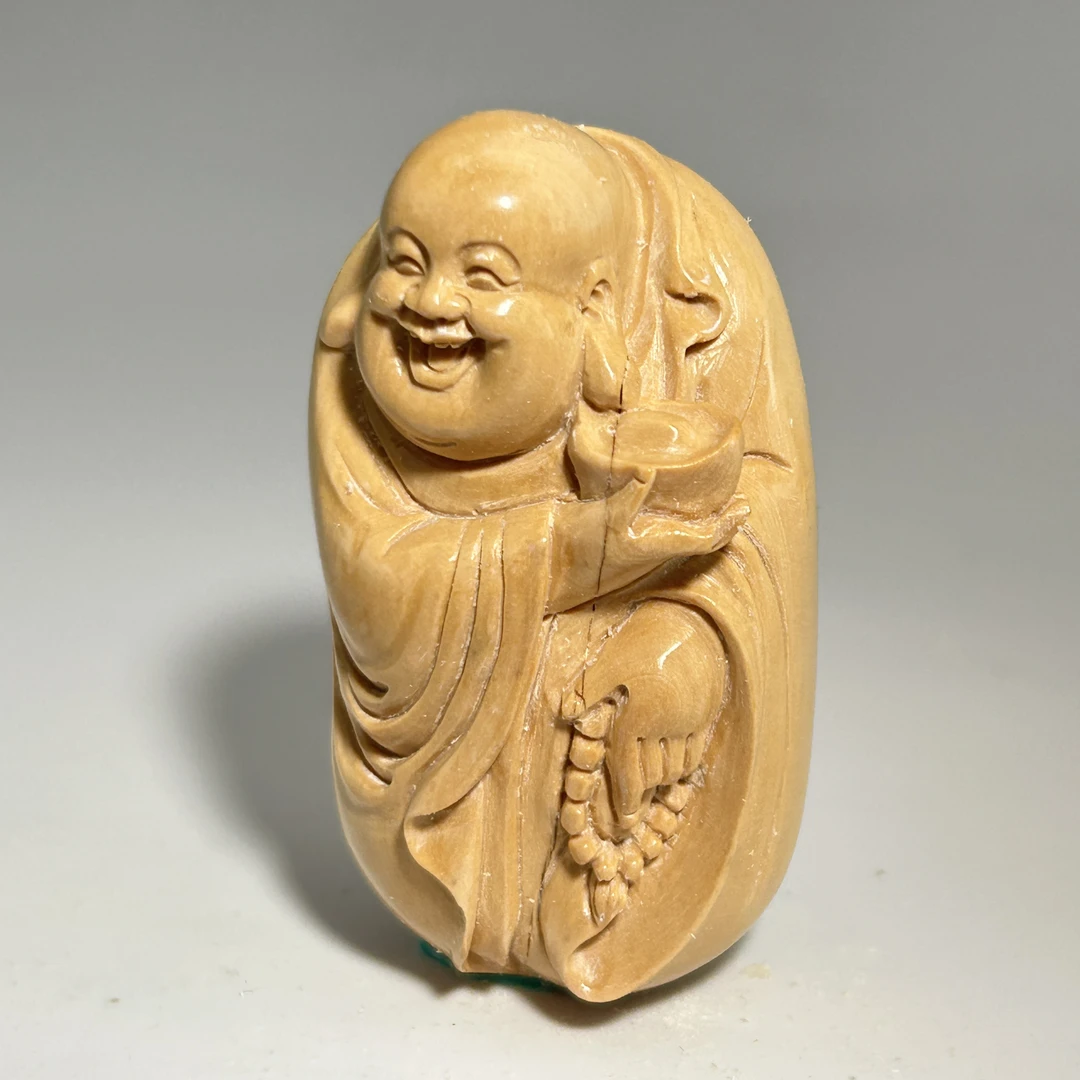 猛犸牙雕奶黄弥勒把件49*26*19mm假一罚四X1148