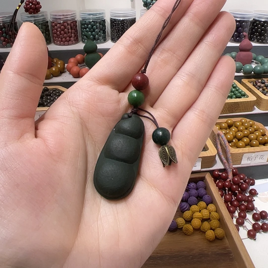 泥塑合香珠福豆福荚手机挂饰