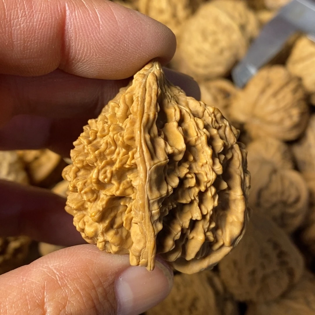 还***儿文玩核桃吊坠文玩核桃