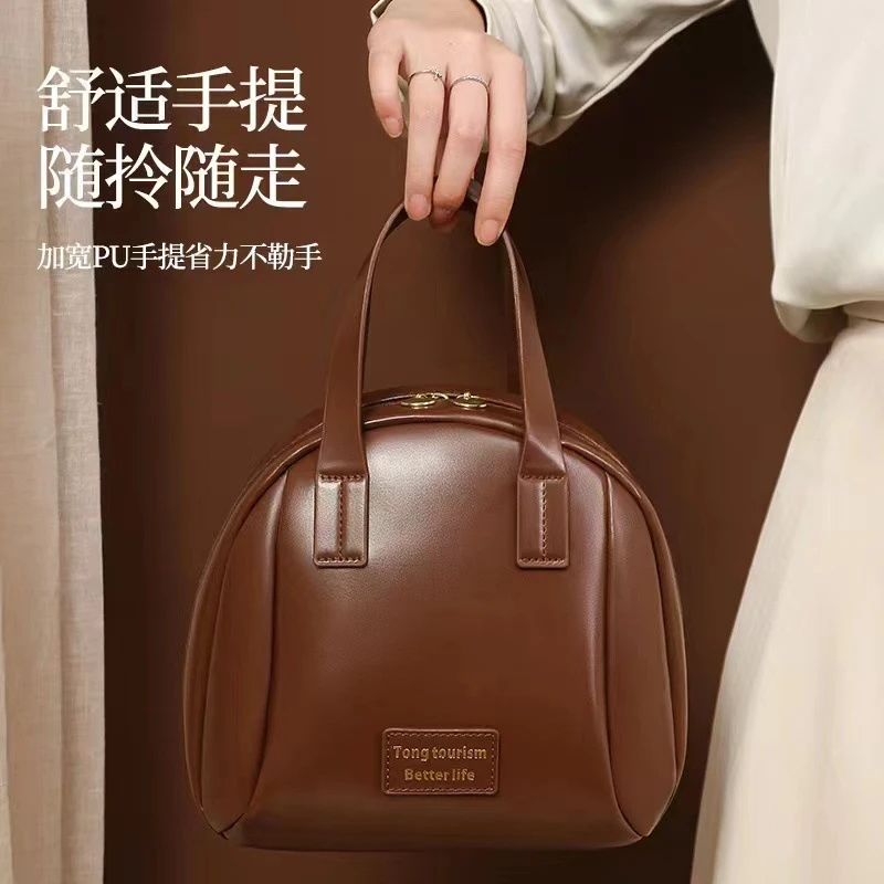 高级感便携轻奢手提化妆包大容量便携2024新款旅行护肤品收纳袋