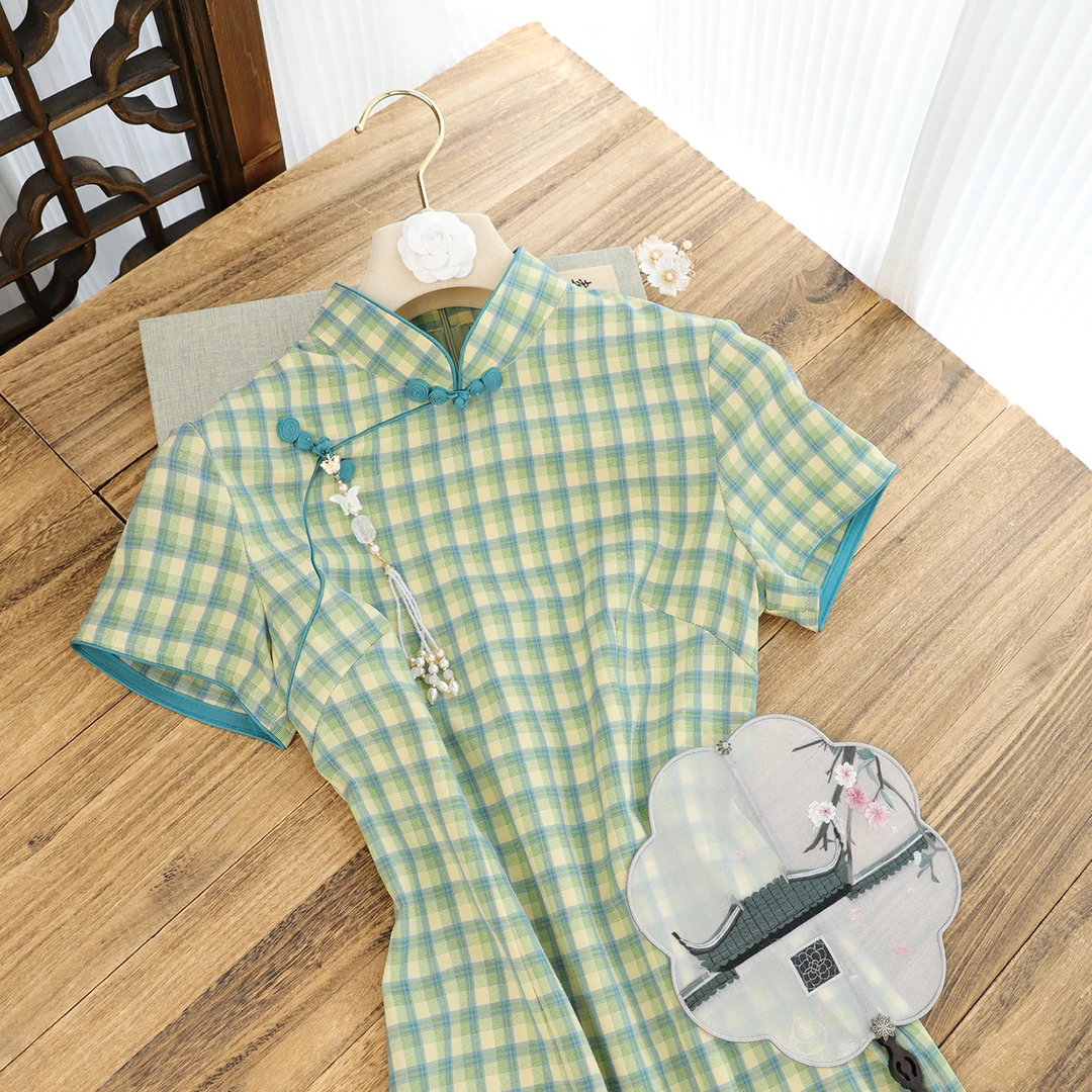 俏娘鱼2025夏季新款绿色改良文艺新中式格子旗袍女日常可穿年轻款