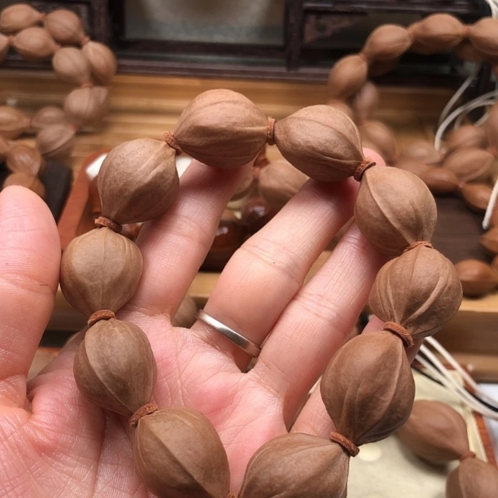 橄榄核手串梅林铁核19 X25四花