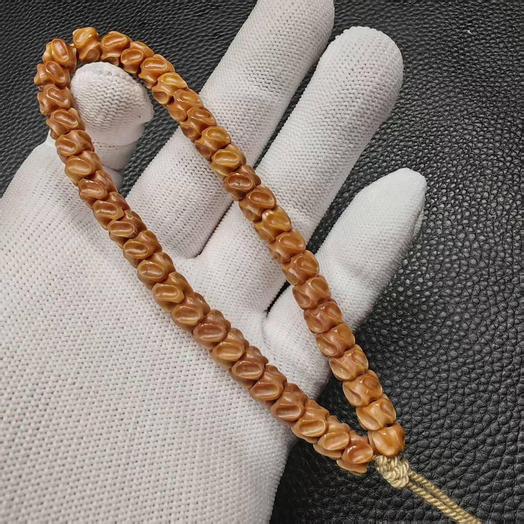 尺寸7.8mm左右龙脊菩提老料雕刻龙骨手持一条《小鱼文玩》