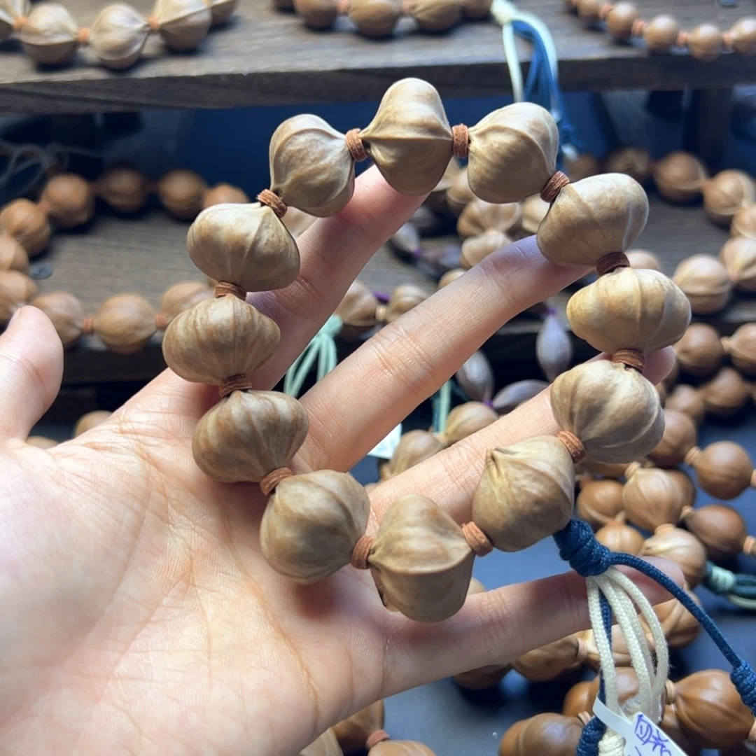 手串橄榄核搏****l24，21