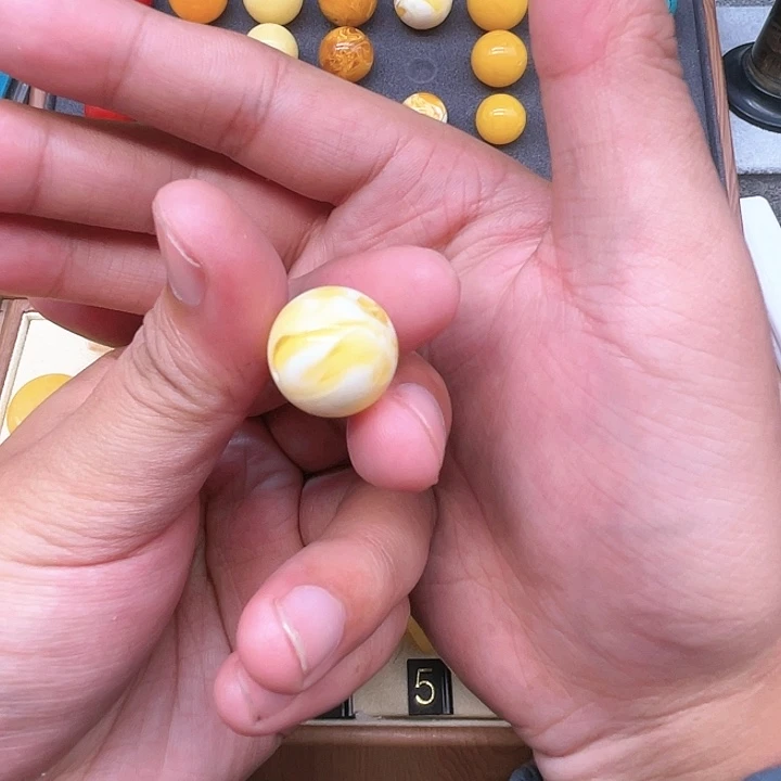 琥珀未镶嵌裸石黄白妖花单珠