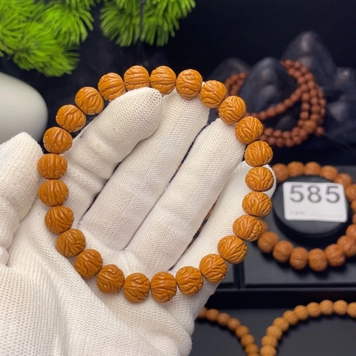 Y***^吊坠桃核小金豆1.0