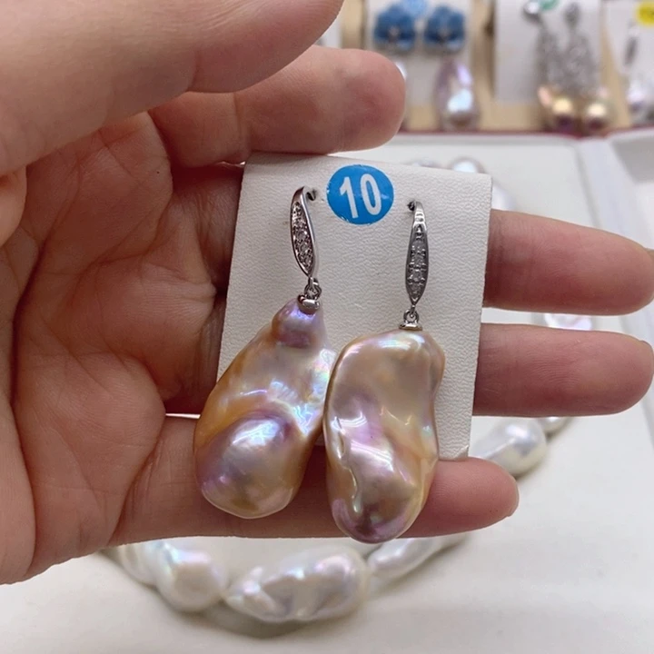 银S925镶嵌淡水珍珠耳饰春***话