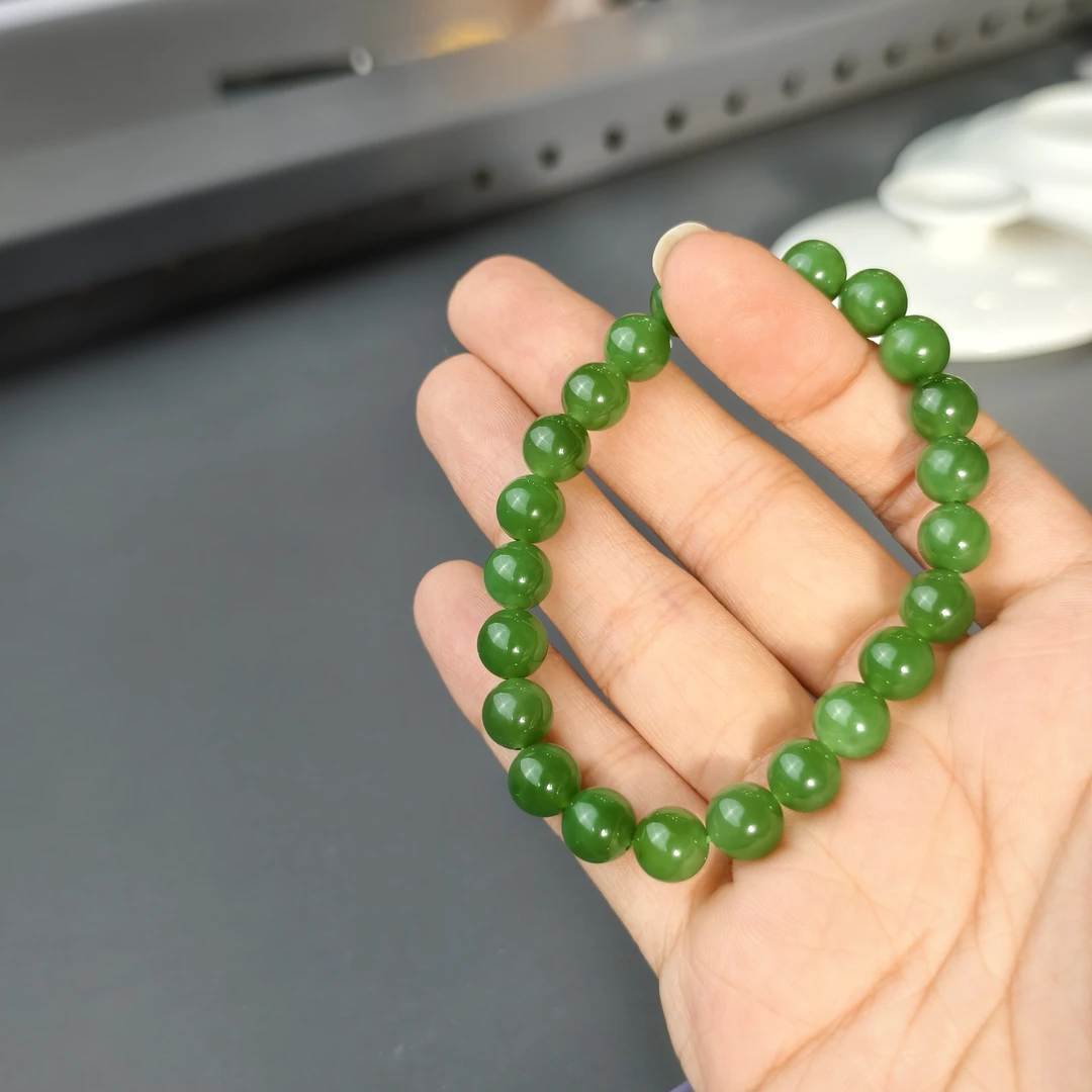 约8mm俄料浓阳绿碧玉圆珠单圈手串