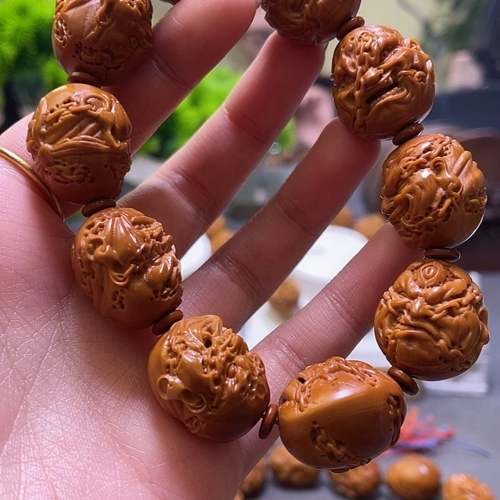 值***得橄榄核吊坠橄榄核雕