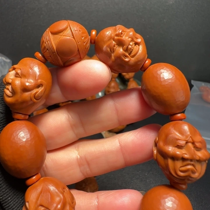 橄榄核手串喜怒哀乐