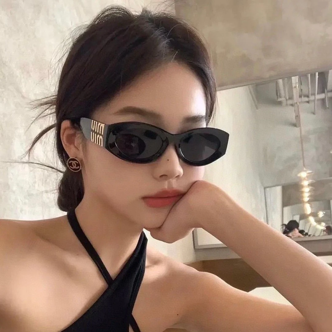 新款甜酷少女感Miu金属侧标猫眼太阳镜时尚黑复古墨镜网红眼镜