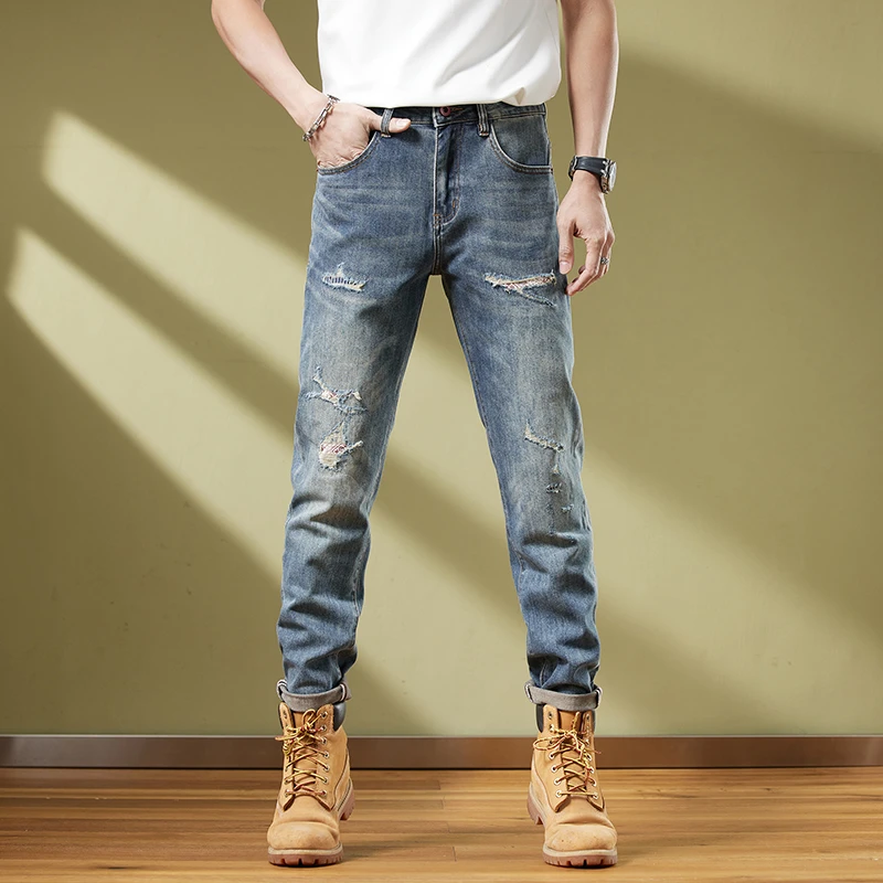 夏季高端牛仔裤新款男装休闲破洞街头薄款弹力修身小脚长裤693