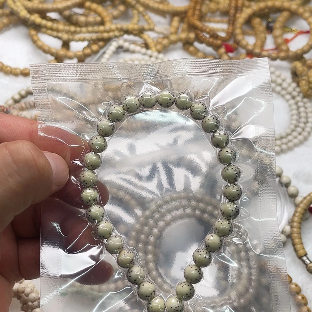 吊坠星月菩提同枝古瓷白8圆手持