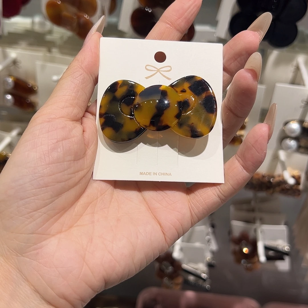 布艺非金属玳瑁色蝴蝶结
