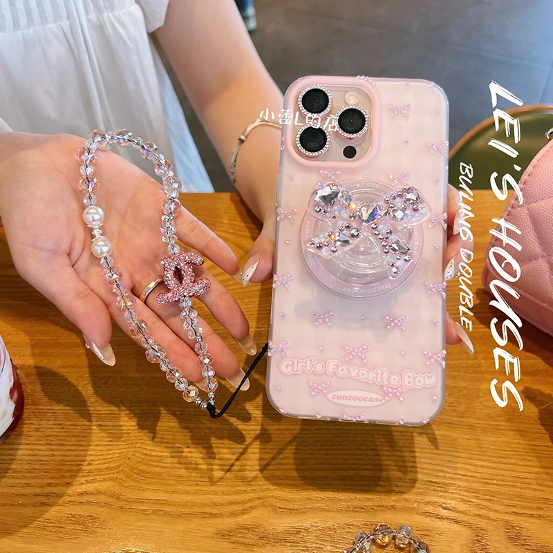 蝴蝶结磨砂水钻手机壳磁吸气囊支架kitty摇摇乐17pro适用16promax