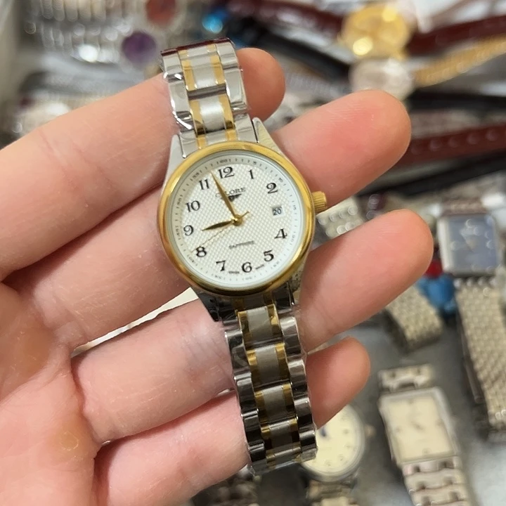 自***花钢牛皮（革）钢石英机芯