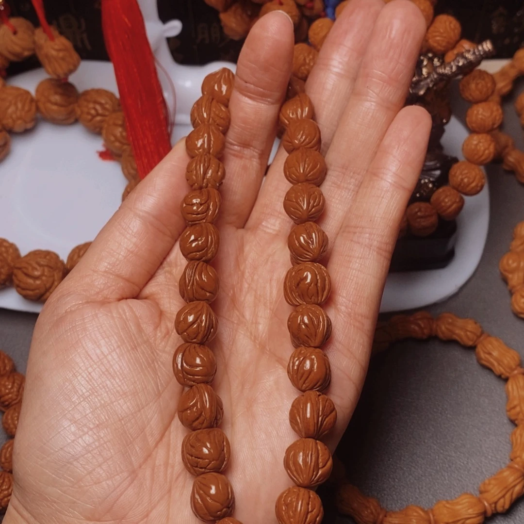 桃核吊坠桃枭手持1