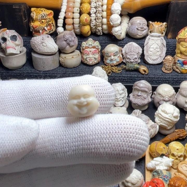 无非金属荷*配饰鹿角雕刻佛头