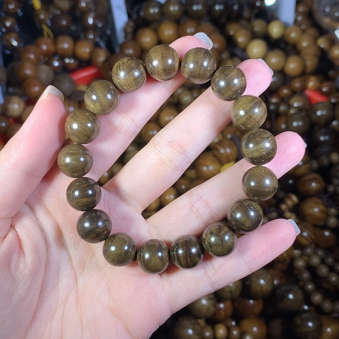 掌***師金丝楠工艺品金丝楠