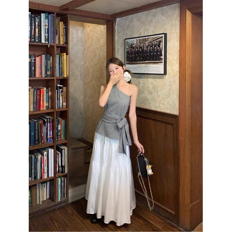 温婉大方衣服不规则斜肩吊带背心绑带上衣高腰白色半身裙拼接长裙