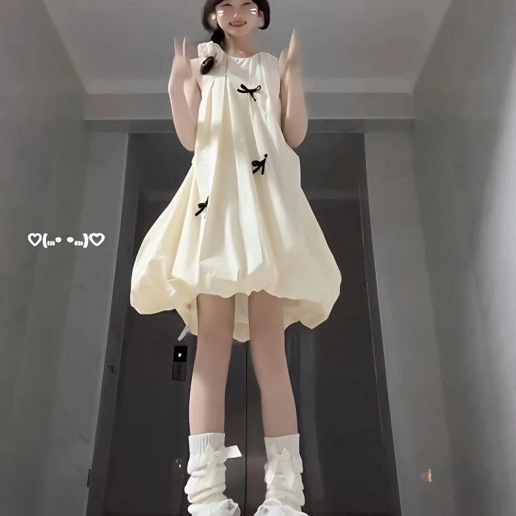 温柔甜美风蝴蝶结黄色无袖背心连衣裙女学生夏季新款高级显瘦短裙