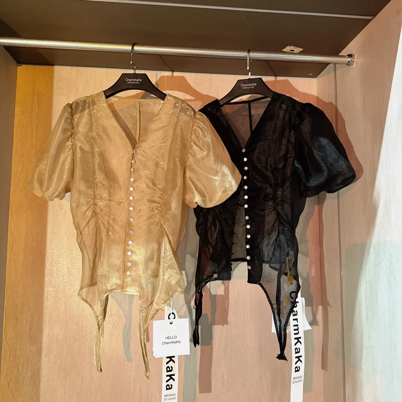 61449暗花灯笼袖不规则衬衫