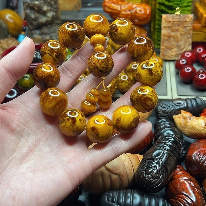 2.0雷击琥珀木手串的