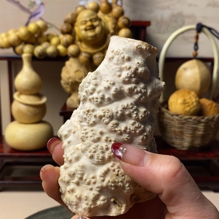 香榧木晓**行黄杨木手把件