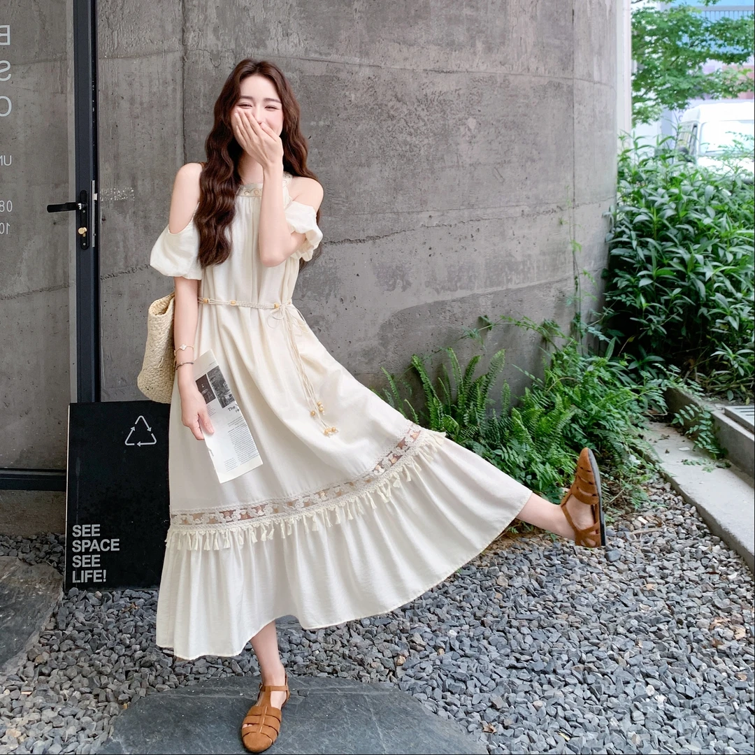 米白色民族风温柔露肩挂脖流苏长裙新款旅游海边度假连衣裙女夏