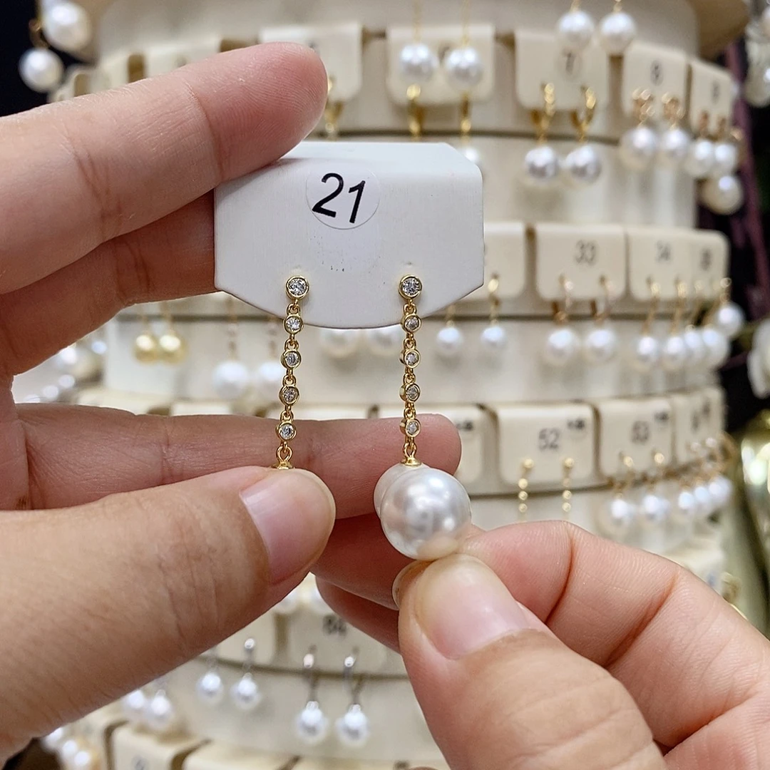 淡水珍珠银S925镶嵌耳饰