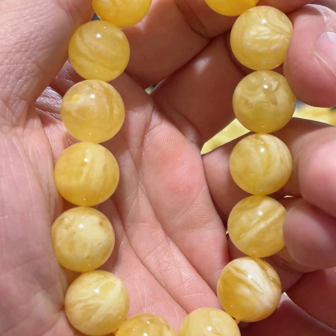 蜜蜡手串未镶嵌勇***?琥珀蜜蜡手串14mm+