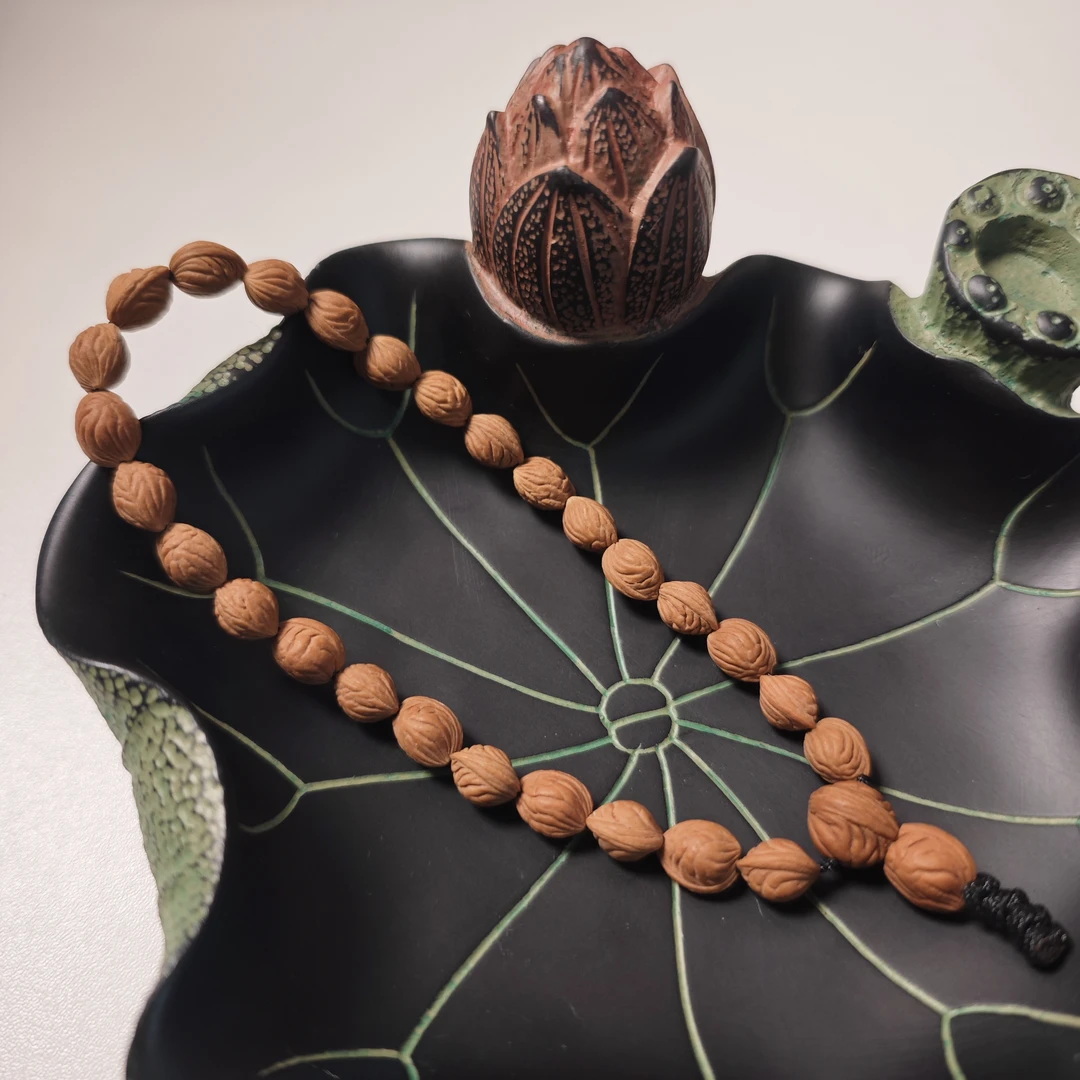 7+原皮无修秦岭龙纹桃核玉龙脊手持(27颗)