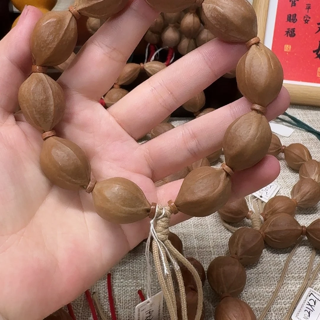 菩***下吊坠橄榄核梅林铁核1926