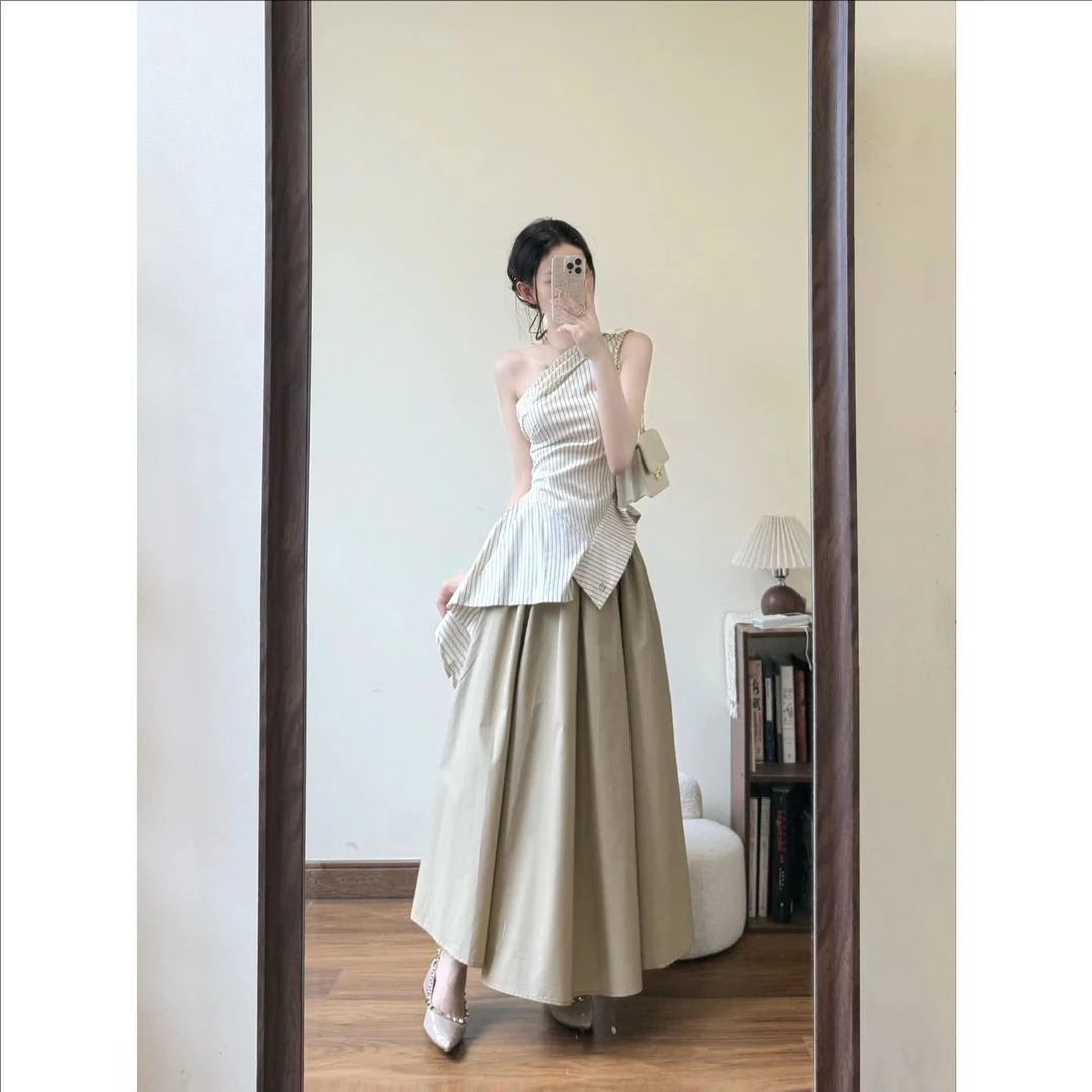 高级感简约不规则斜肩条纹吊带上衣女高腰A字伞裙套装