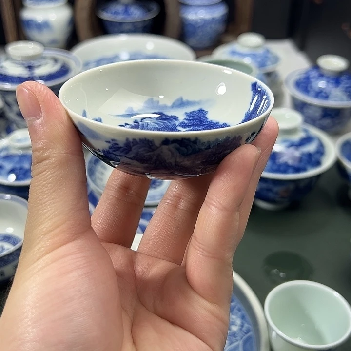 北****微瑕柴窑工笔山水卧足普洱杯