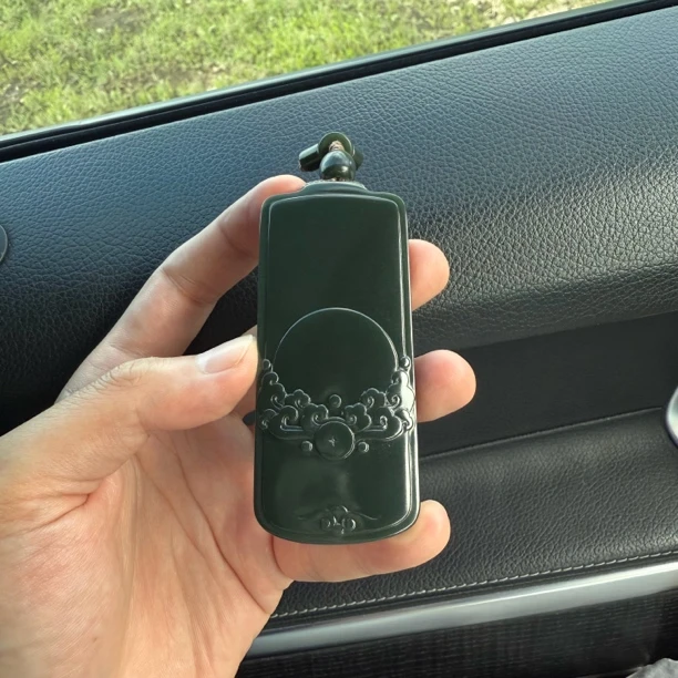 黑羊脂析木河磨玉93克旭日东升手把牌结构细腻手推出油