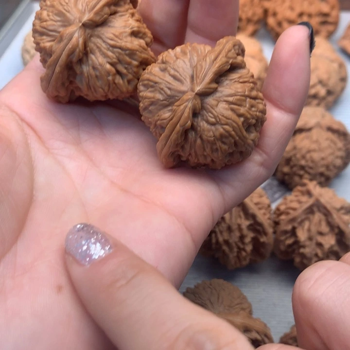 K***K文玩核桃把件白狮子