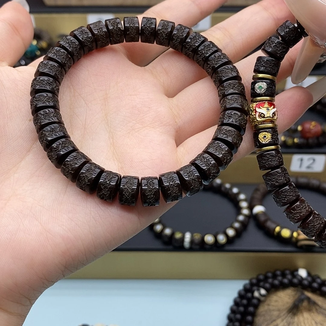 椰蒂手串原生态9*6加狮子配饰和图上两颗标