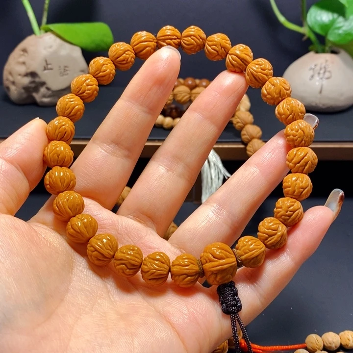 手串桃核野生凤羽手持