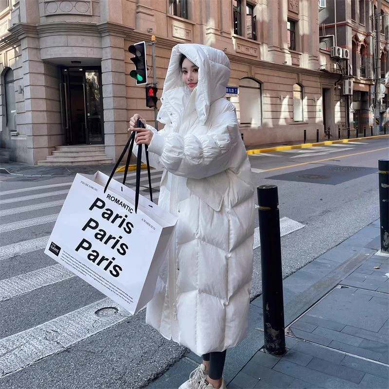 时尚白色服女2025冬季新款长款过膝韩版宽松连帽外套棉服