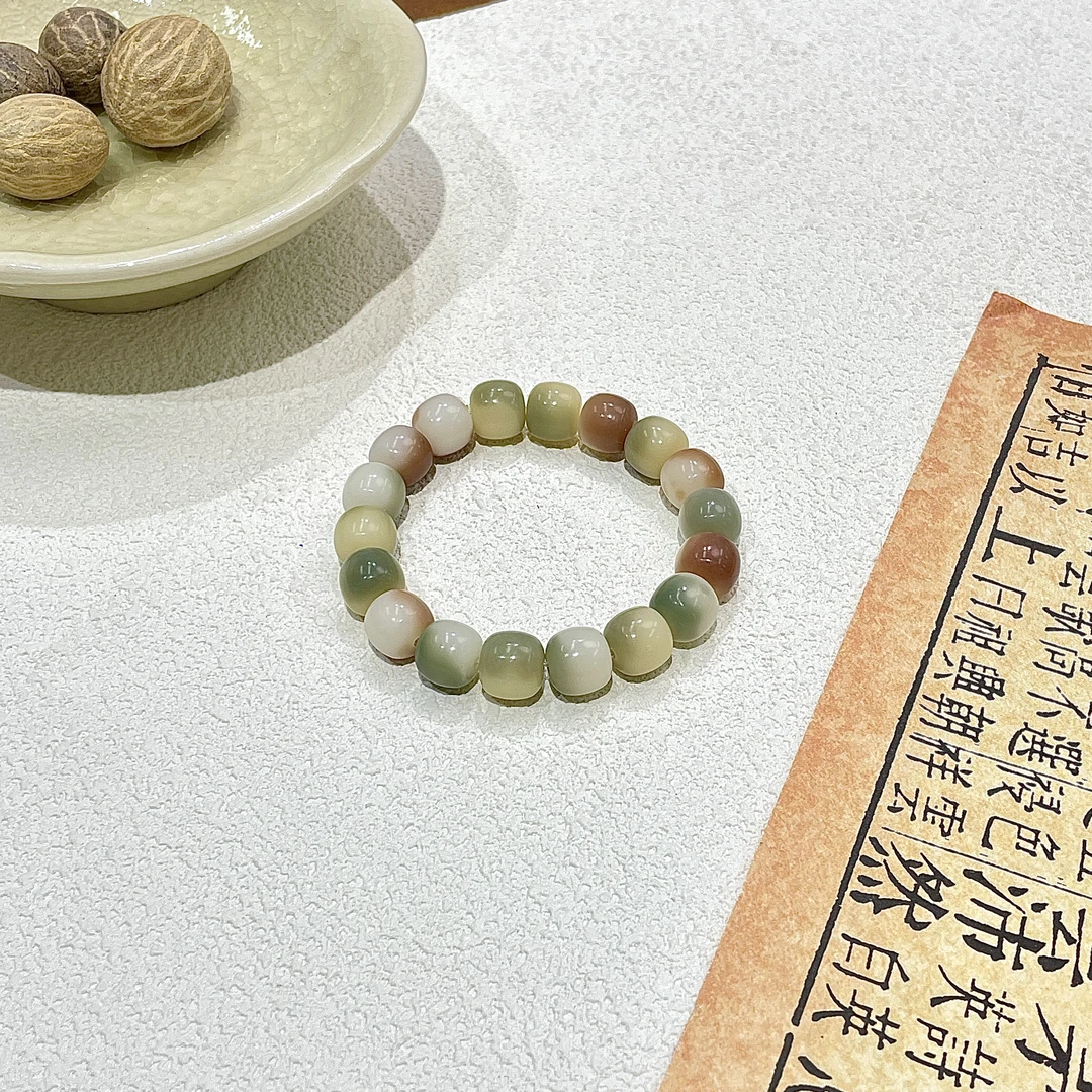 彩虹色飘花老型桶菩提手串11*10mm     D-A469040