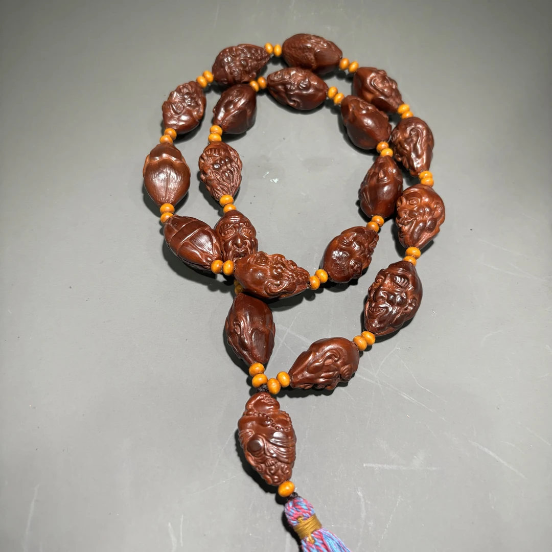 HZ85771橄榄核雕手持-朵云轩