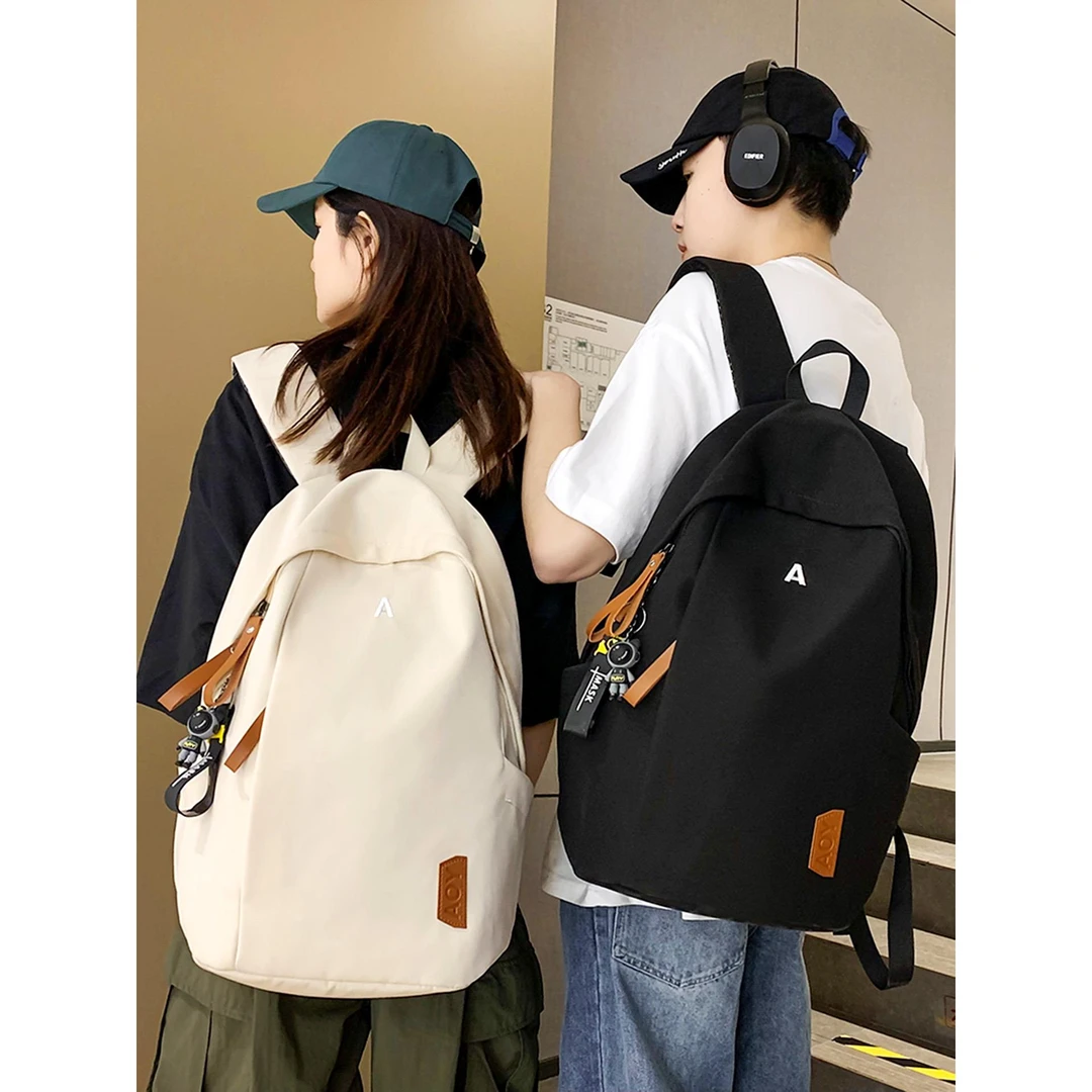 书包女生小学生2025新款初中生高中生男生拼接大容量背包双肩包包